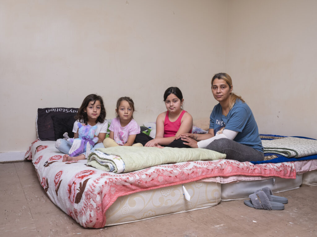 Ariana, 5; Miruna, 6; Silvana, 9; Elena, 34 from Families Living in Temporary Accommodation by Anthony Luvera